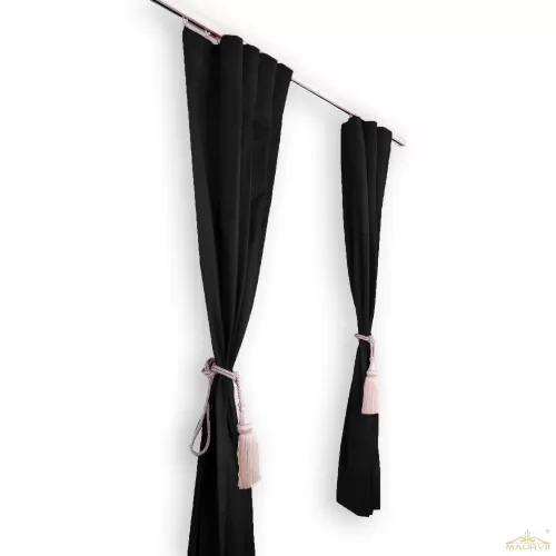 Black curtains with cream color tie back