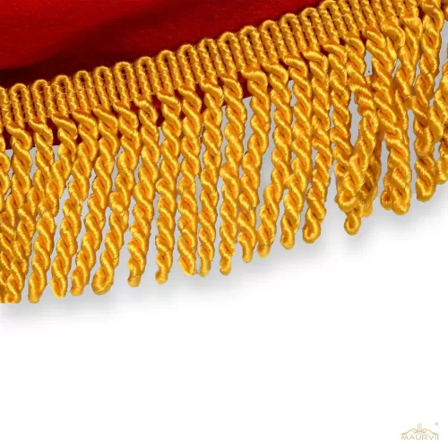 Golden bullion fringe curtains with red drape