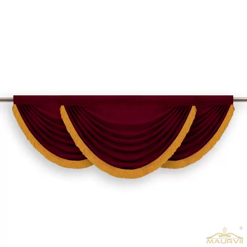 Swag valance with gold trim on a rod