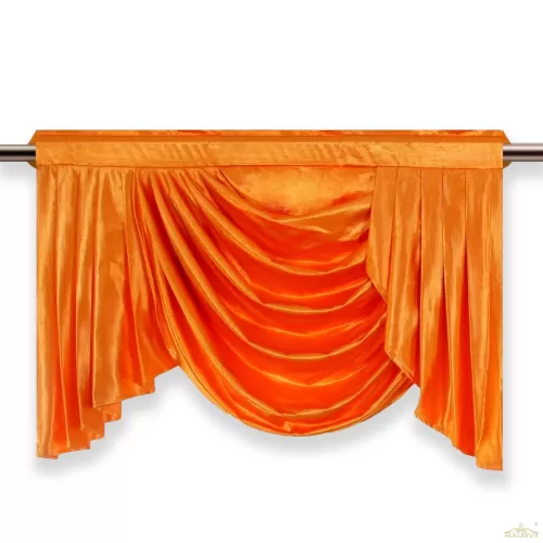 An orange swag window valance with a scarf