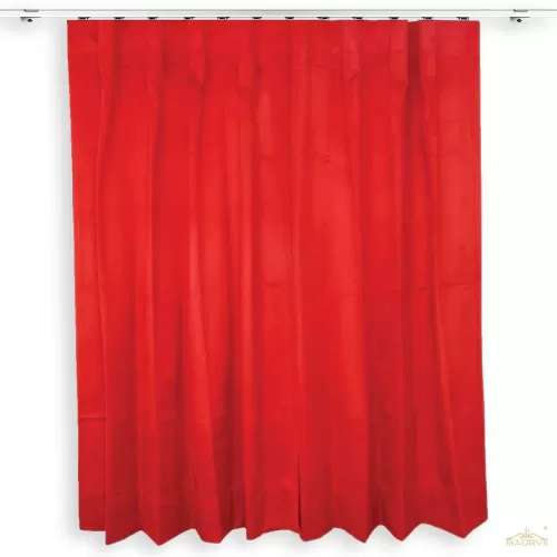Velvet pleated curtains hung with traverse
